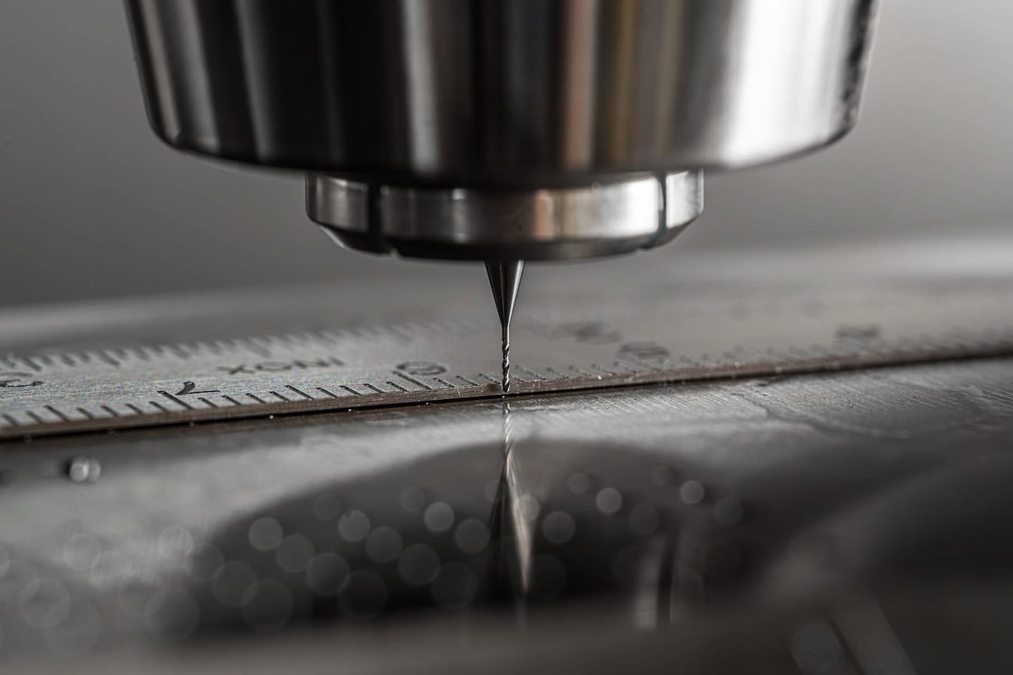 CNC milling machine cutting a metal part in the workshop